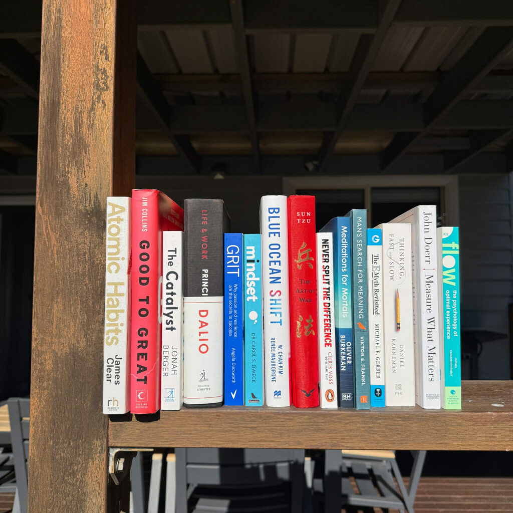 A selection of strategy, leadership and productivity books from HyperWeb's working bookshelf in Newcastle.